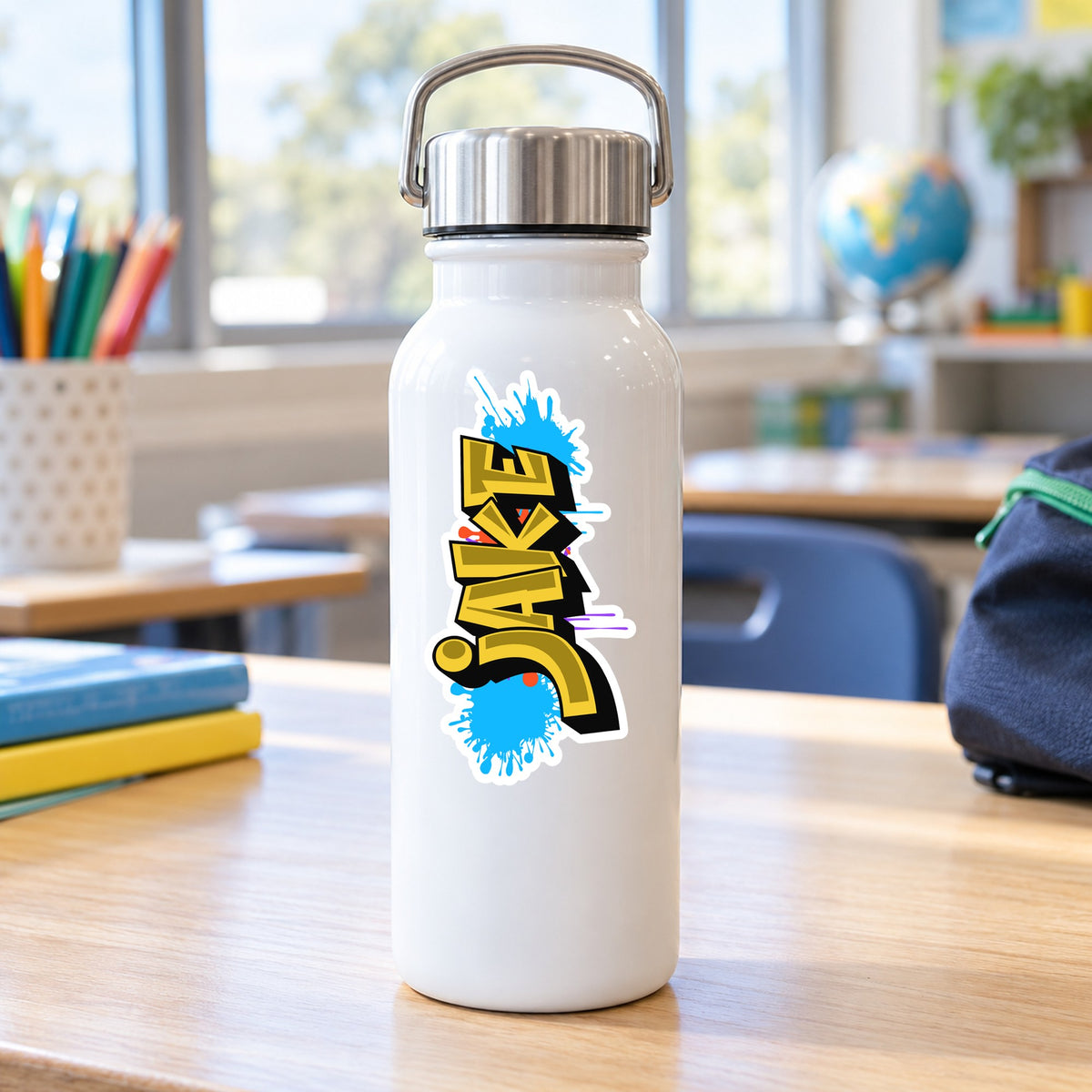 Personalised graffiti name sticker applied vertically to a kids drink bottle