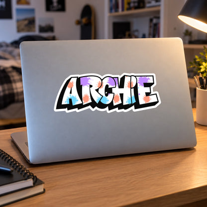 Graffiti name sticker applied to a laptop lid