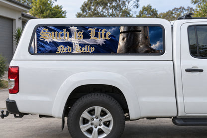 Waving Eureka Ned Kelly perforated sticker on ute canopy-side glass, application mockup