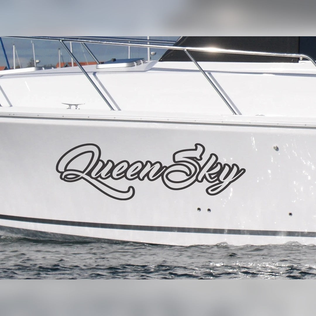 Hull lettering decal – outlined script boat name on the side of a white boat hull