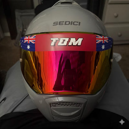 Visor sunstrip decal – Australian flag strip with the name TOM across a mirrored helmet visor
