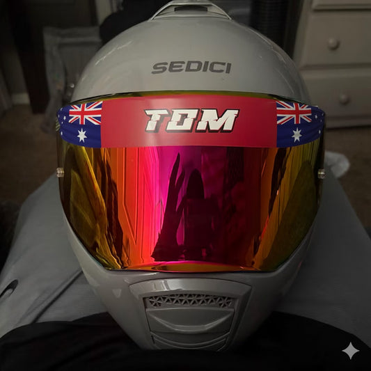 Visor sunstrip decal – Australian flag strip with the name TOM across a mirrored helmet visor