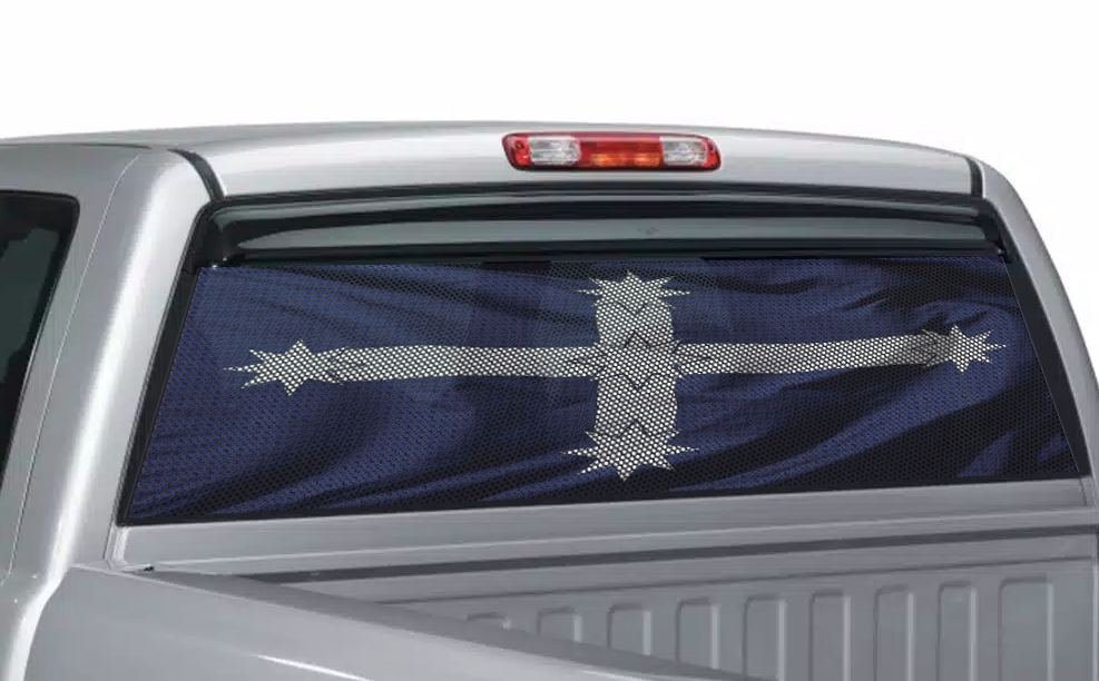 Car window with a perforated sticker featuring a Eureka flag, cross design on a blue background.