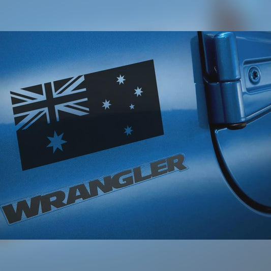Anzac flag decal – black Australian flag on the blue door of a 4x4 next to its model lettering
