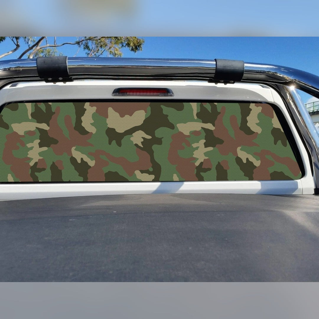 Camouflage perforated window sticker – green, brown and tan pattern across a ute rear window