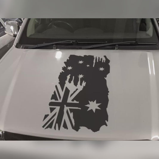 Distressed Australian flag single colour decal – dark grey flag cut-out on the bonnet of a silver car