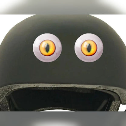 Eyeball eye stickers – pair of yellow cat-style eyes applied on a dark green helmet