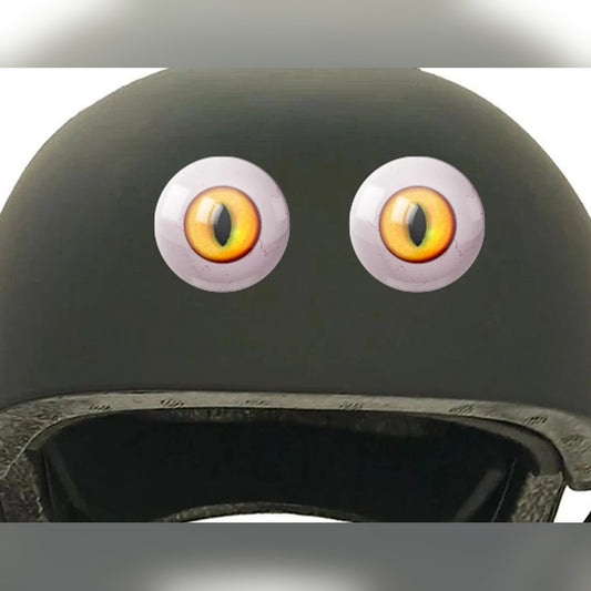 Eyeball eye stickers – pair of yellow cat-style eyes applied on a dark green helmet