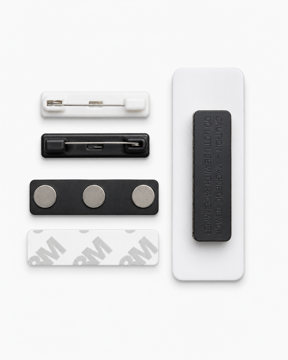 Set of magnetic clips and strips on a white background
