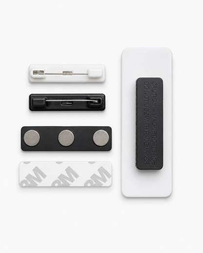 Set of magnetic clips and strips on a white background