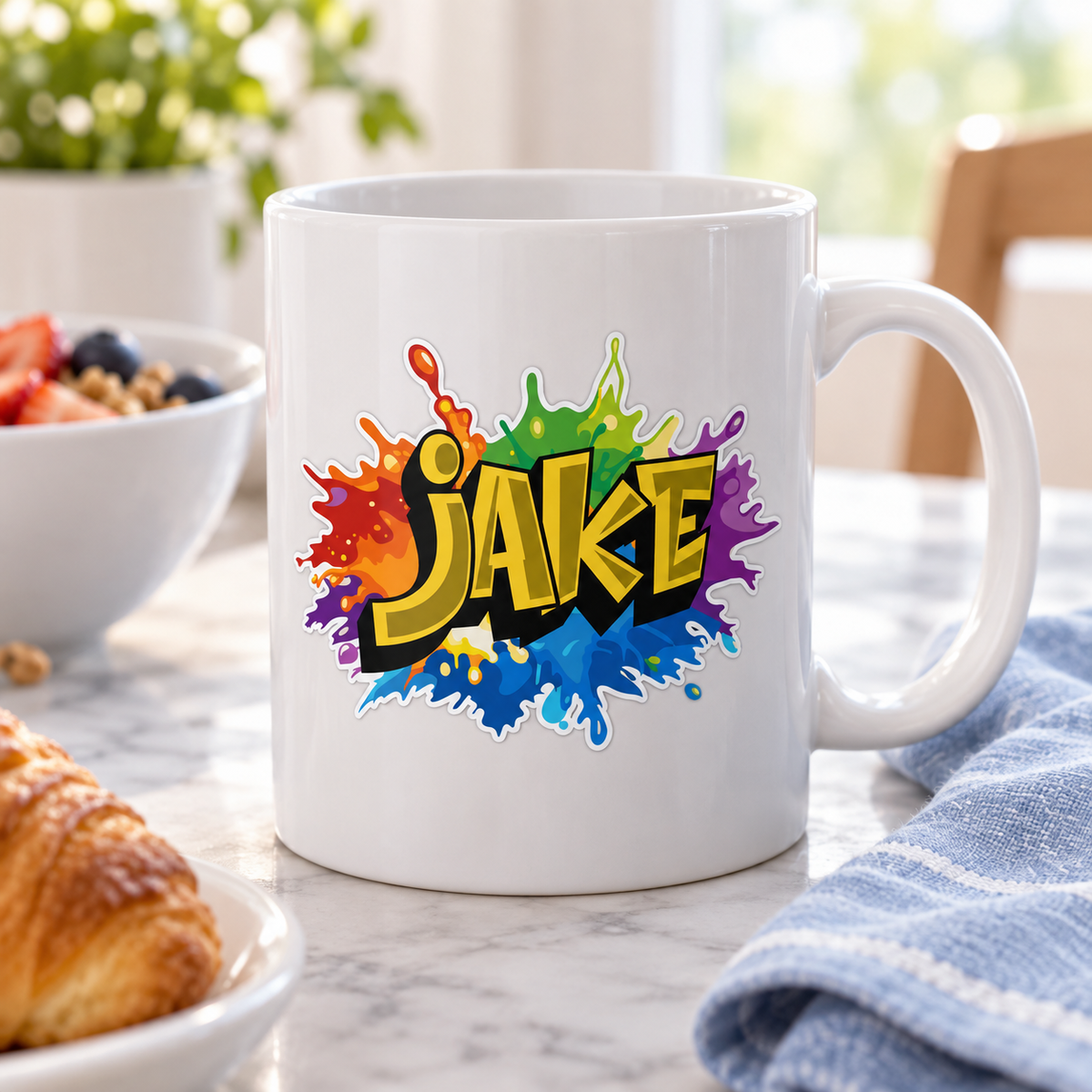 Custom rainbow graffiti name sticker shown on the exterior of a white mug, away from the rim