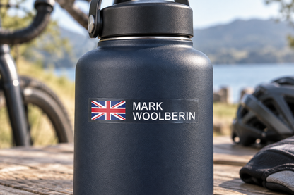 Option 4 block capital flag and name sticker on a navy drink bottle