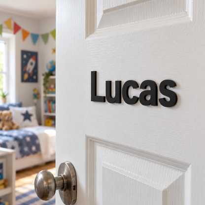 Black matt acrylic letters 'Lucas' on a white bedroom door