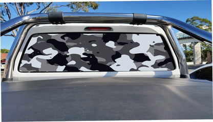 Urban camouflage perforated sticker trimmed to a ute rear window, application mockup