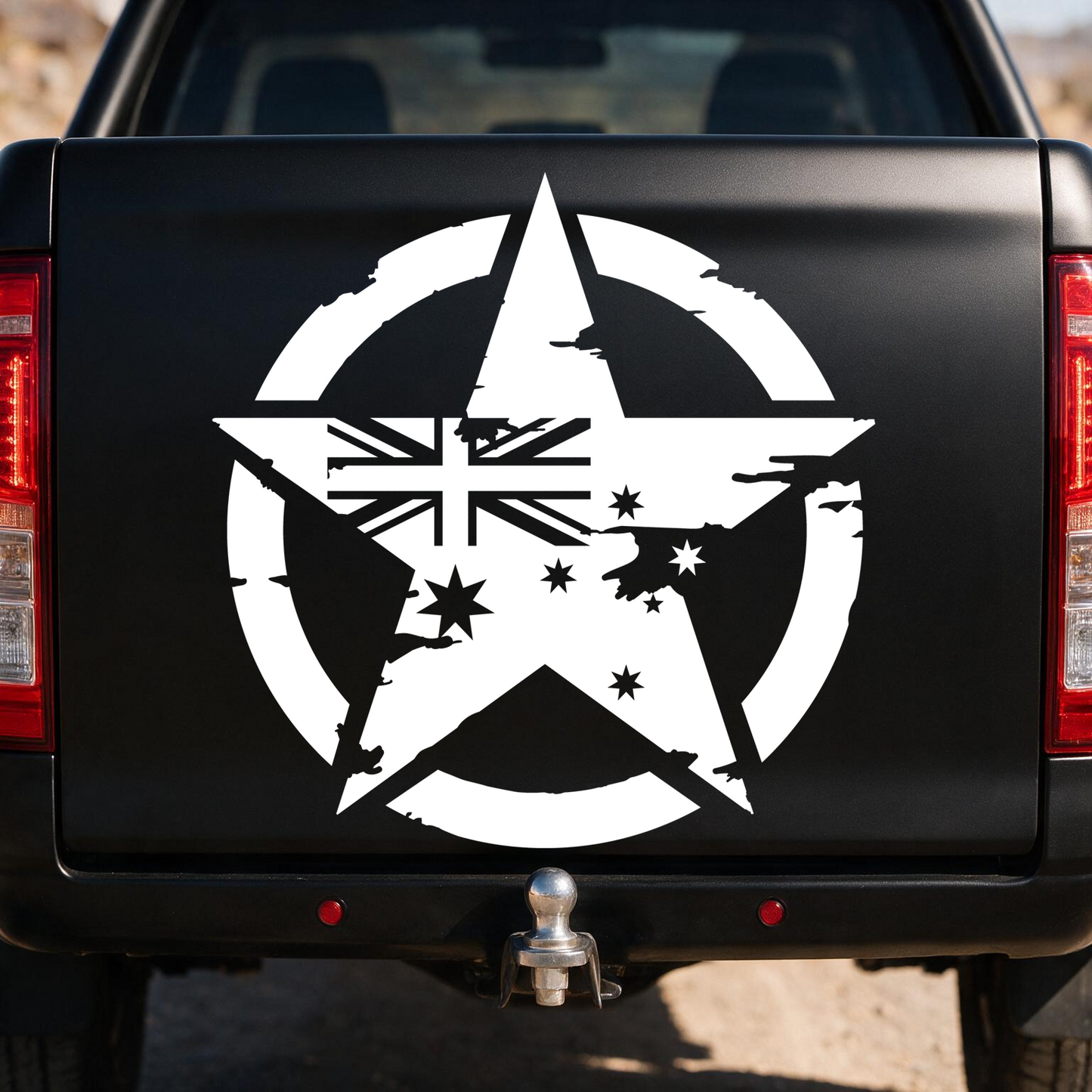110cm distressed military star decal in white on the tailgate of a matte black ute