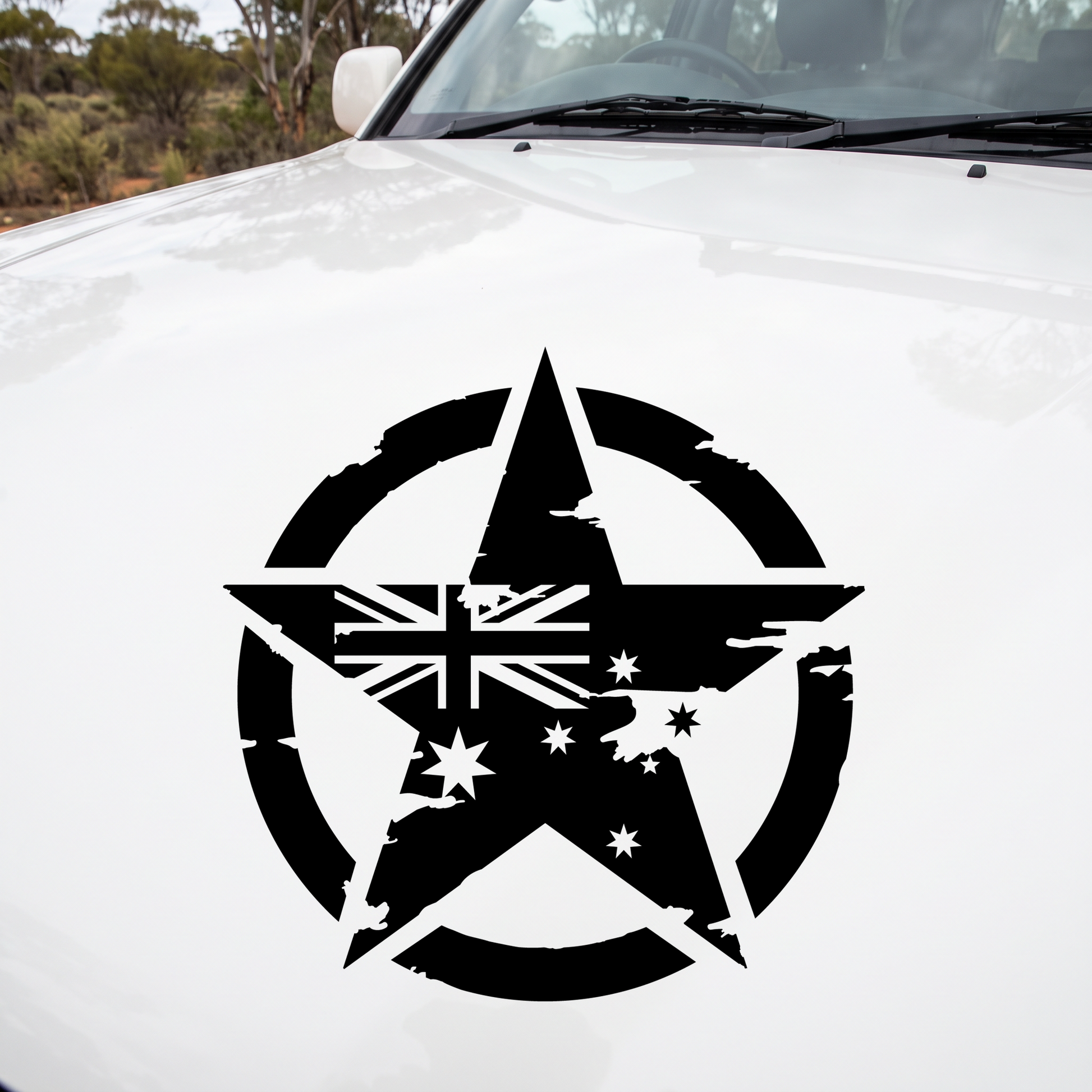 90cm distressed military star decal in black on the bonnet of a white four-wheel drive