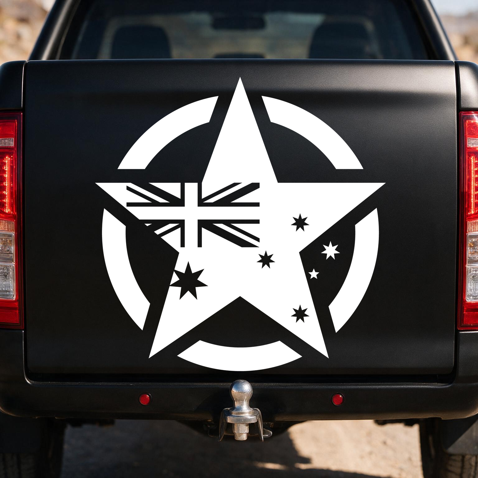 110cm solid military star decal in white on the tailgate of a matte black ute