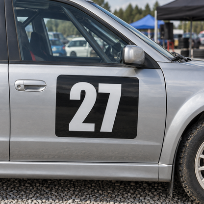 Black rectangle race number background panel on a silver car door, shown with an example number 27, numbers not included