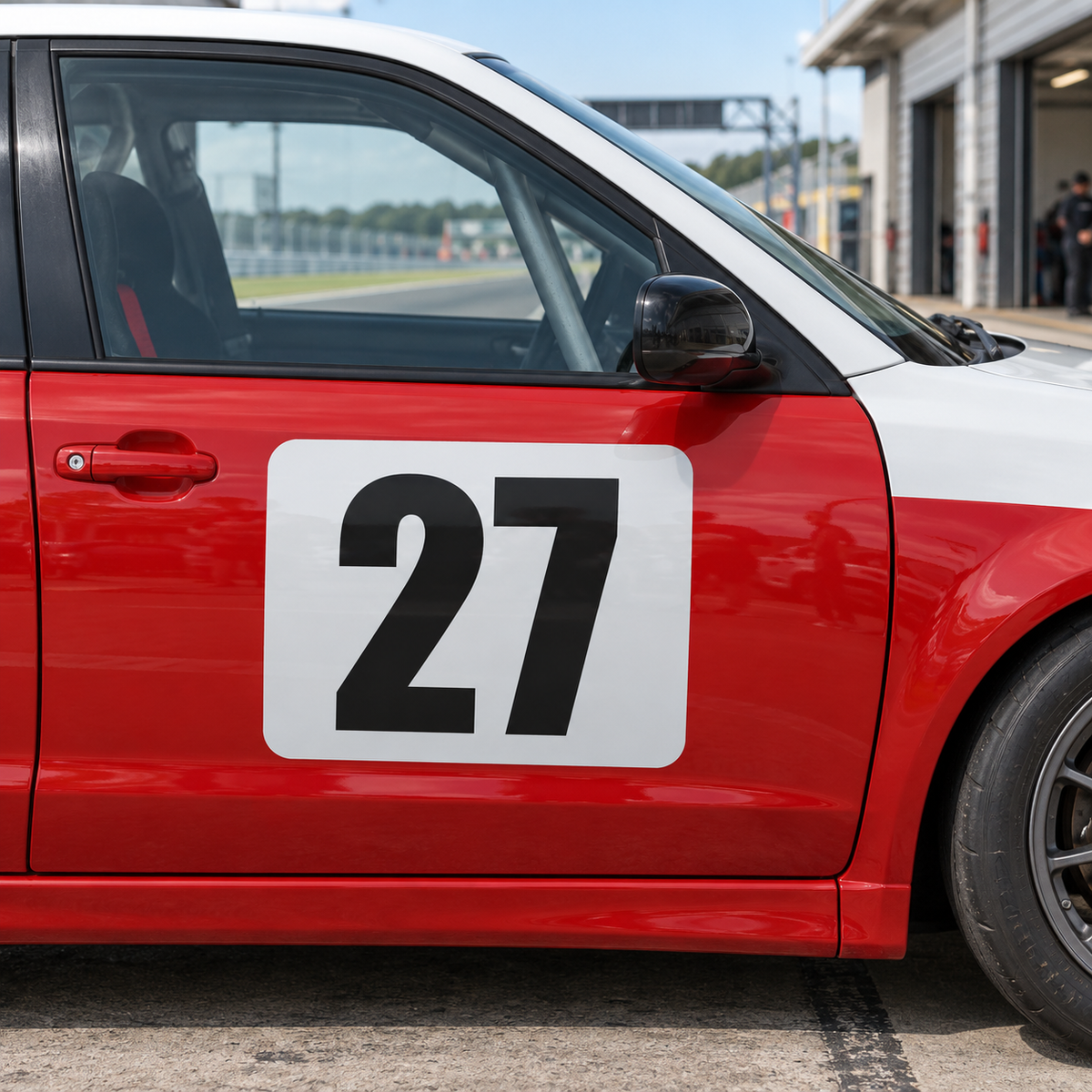 White rectangle race number background panel on a race car door, shown with an example number 27, numbers not included