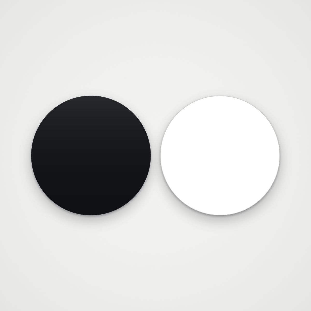 Black and white gloss round race number background panels side by side, blank, numbers not included