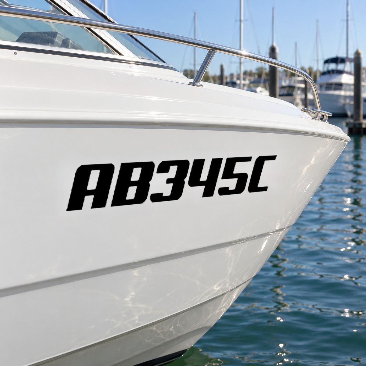AB345C registration decal on the bow of a white fibreglass recreational boat.