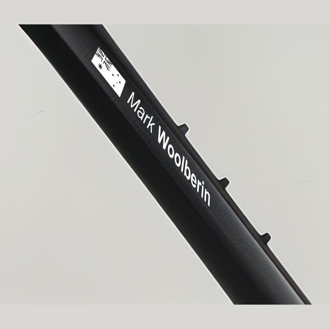 Bike name decal – white Australian flag and name Mark Woolberin along a black bike frame tube