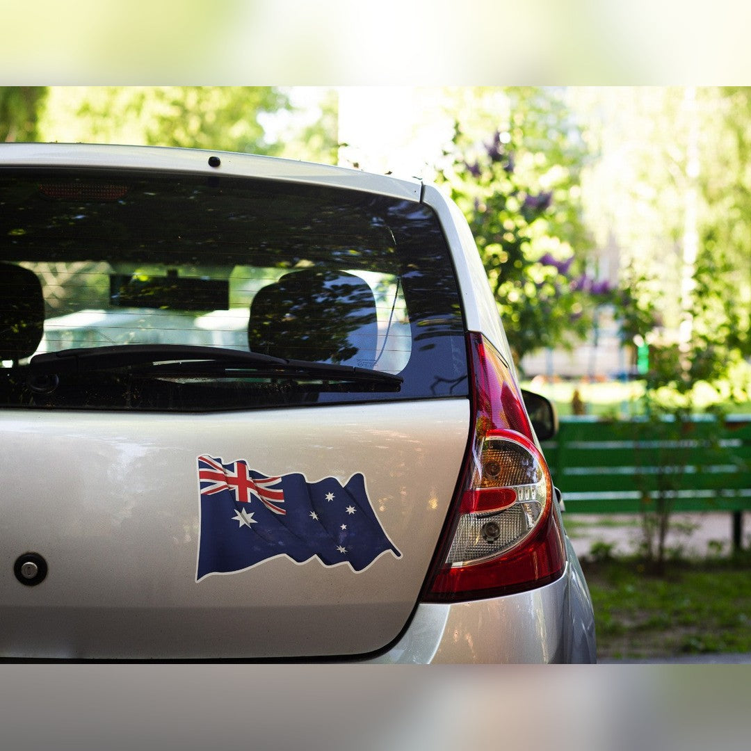 Waving Australian flag decal – flag sticker with white border on a silver hatchback boot lid