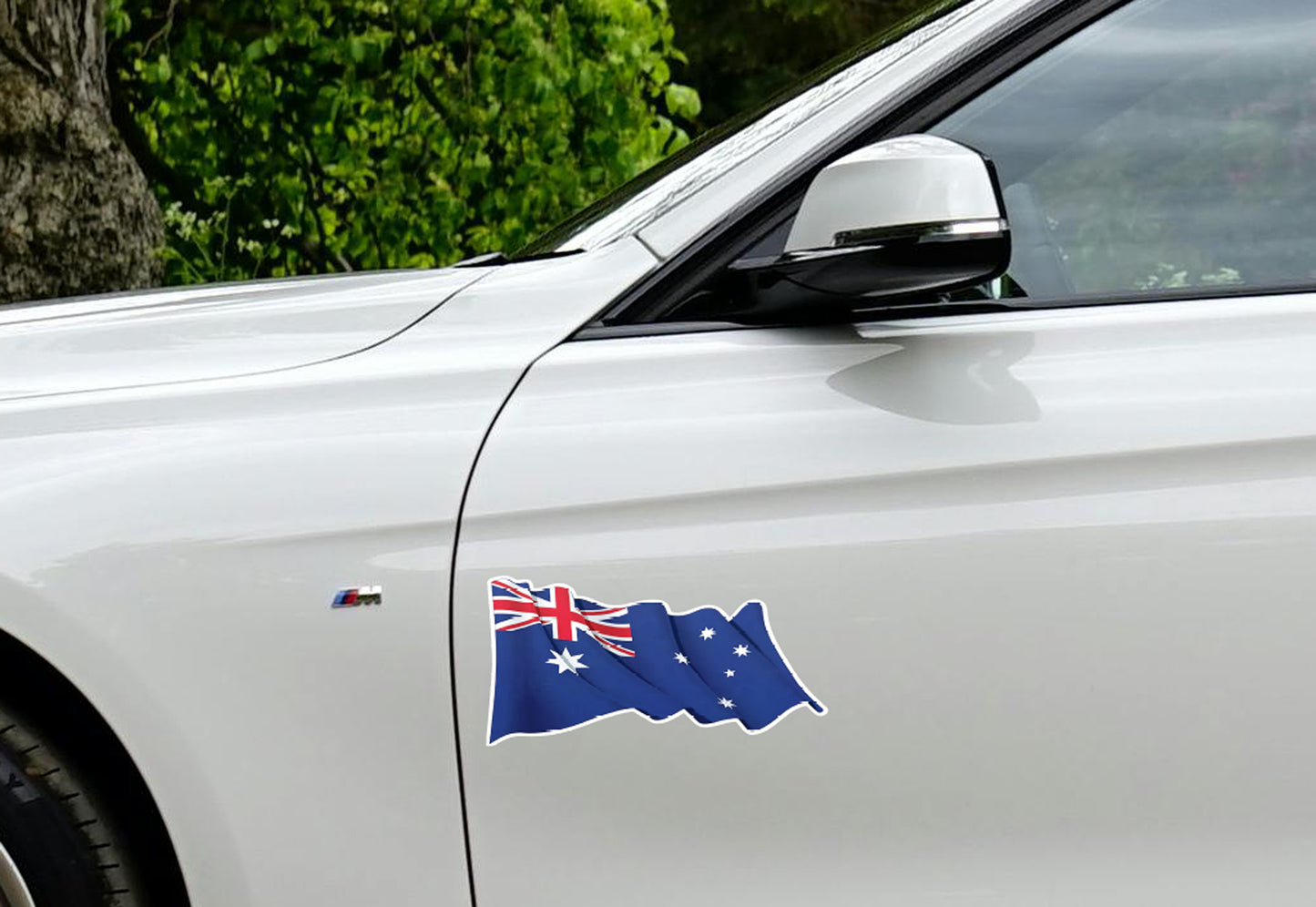 Car with an Australian flag decal on a white background