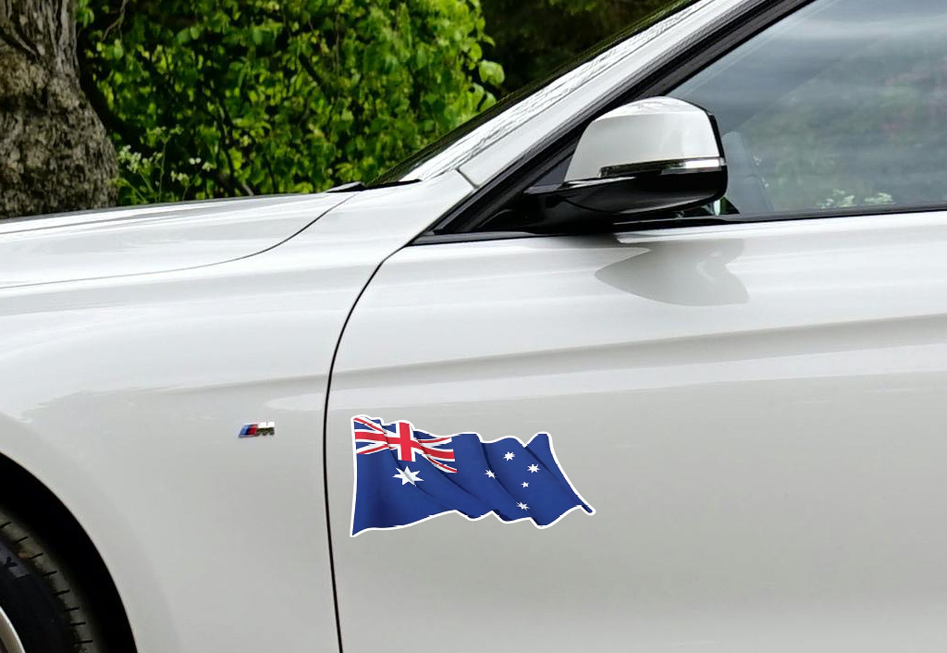 Car with an Australian flag decal on a white background