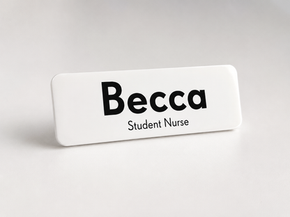 Name tag with 'Becca Student Nurse' text on a white background
